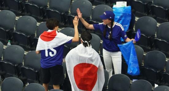 Japan Fans Stay Back to Clean Stadium After Match